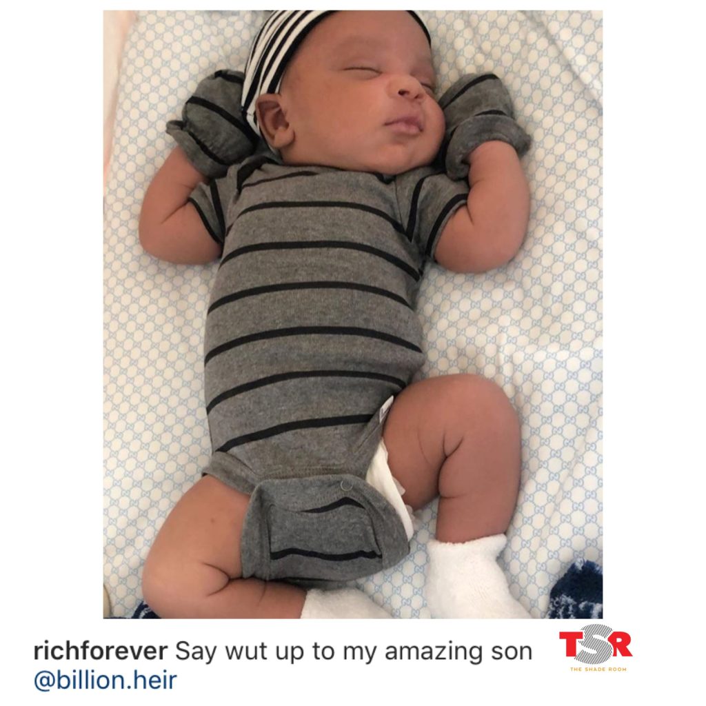 Rich Forever showing off son