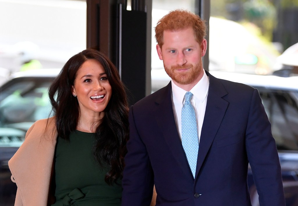 Prince Harry and Meghan Markle are allegedly working with two journalists to write an auto-biography about their royal exit.