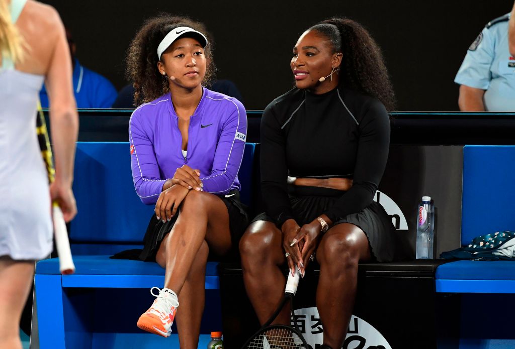 Tennis player Naomi Osaka claps back at two fans after they criticize her for calling Serena Williams her mom in a new Instagram post.