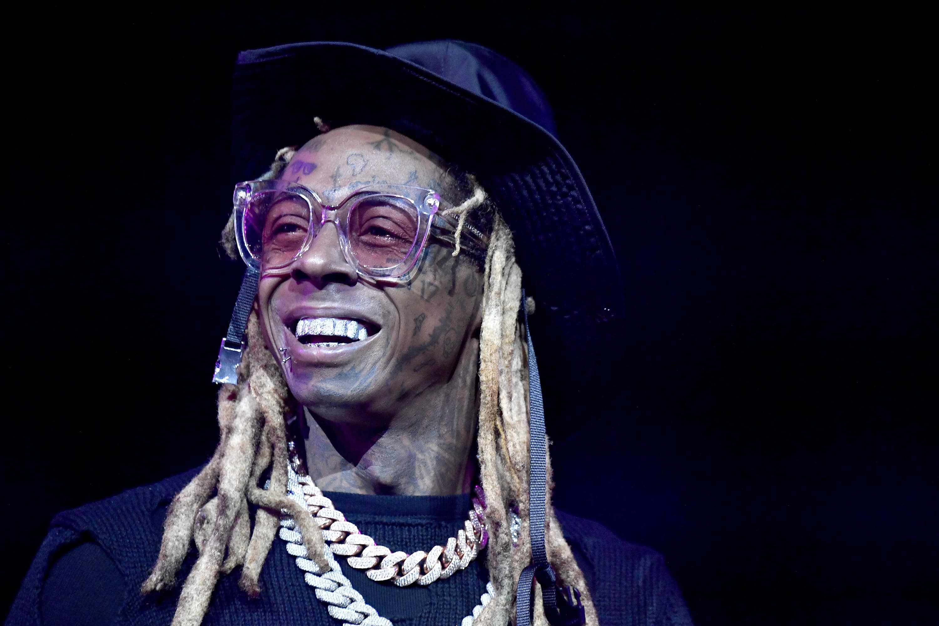 Lil Wayne hints that he may have recently got married after he tweeted that he was the "happiest man in the world."