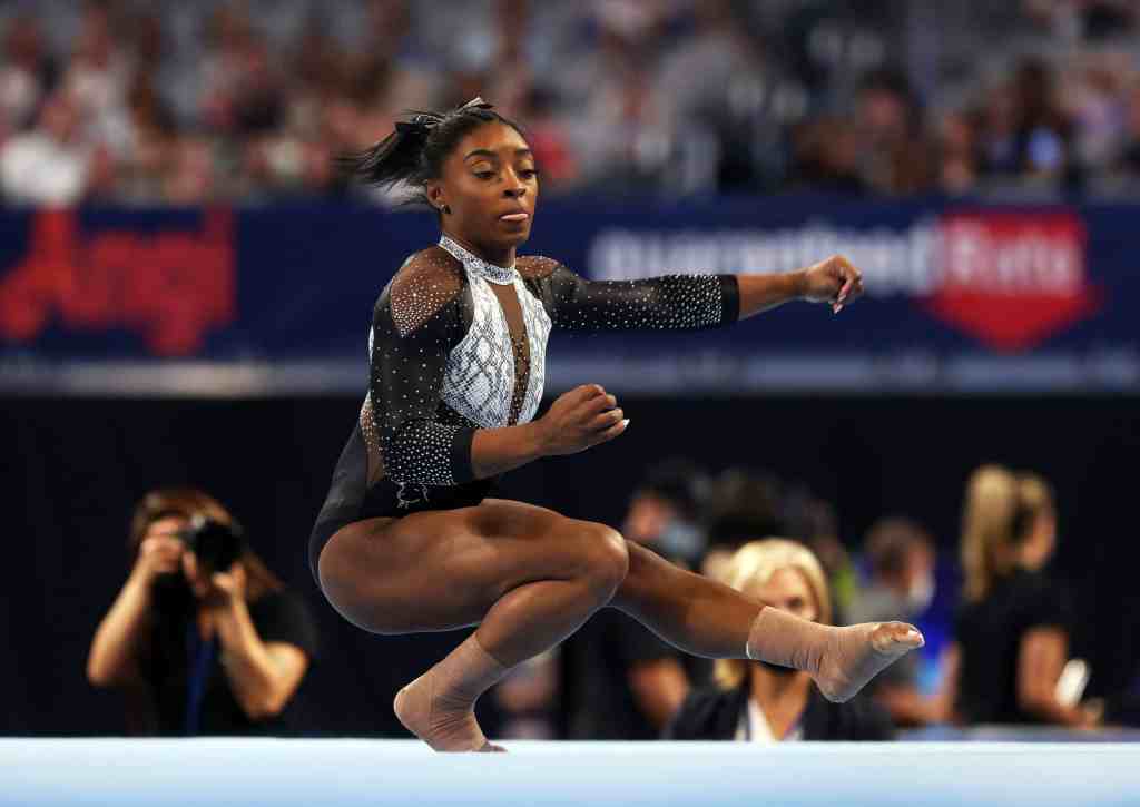 Simone Biles breaks another record and becomes the first woman to win seven U.S. all-around titles as she prepares for Olympics.