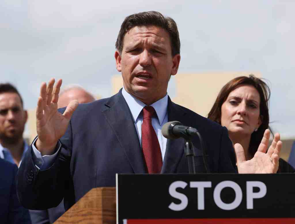 Florida Governor Ron DeSantis' office says school officials' salaries could be withheld if they decide to go against an executive order that bans mask mandates in schools.