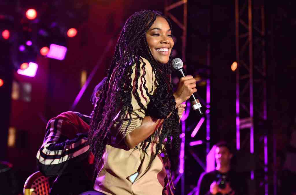 Gabrielle Union celebrated her birthday by enjoying a private performance from R&B group 112 while on vacation.