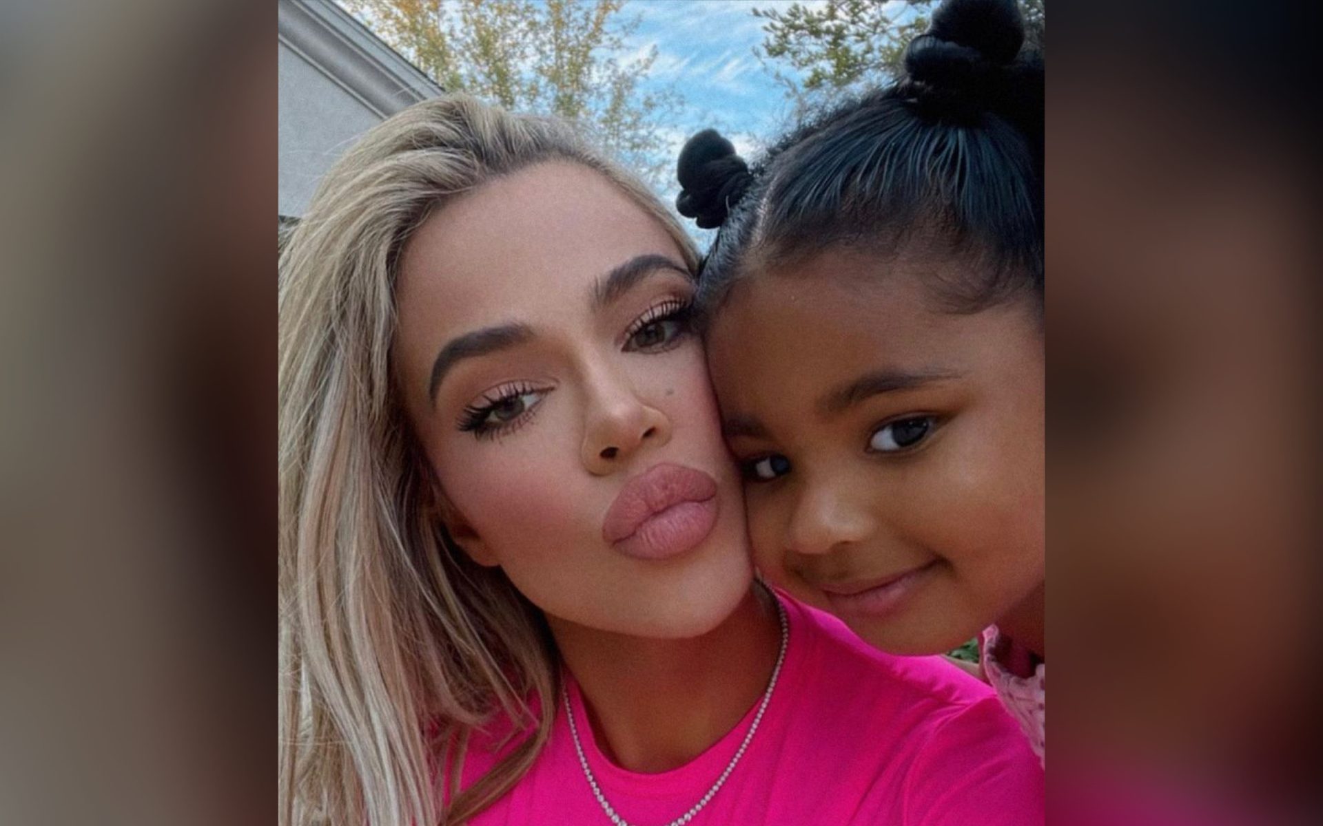 Khloé Kardashian Claps Back At Criticism About Holding Daughter True "Too Much"