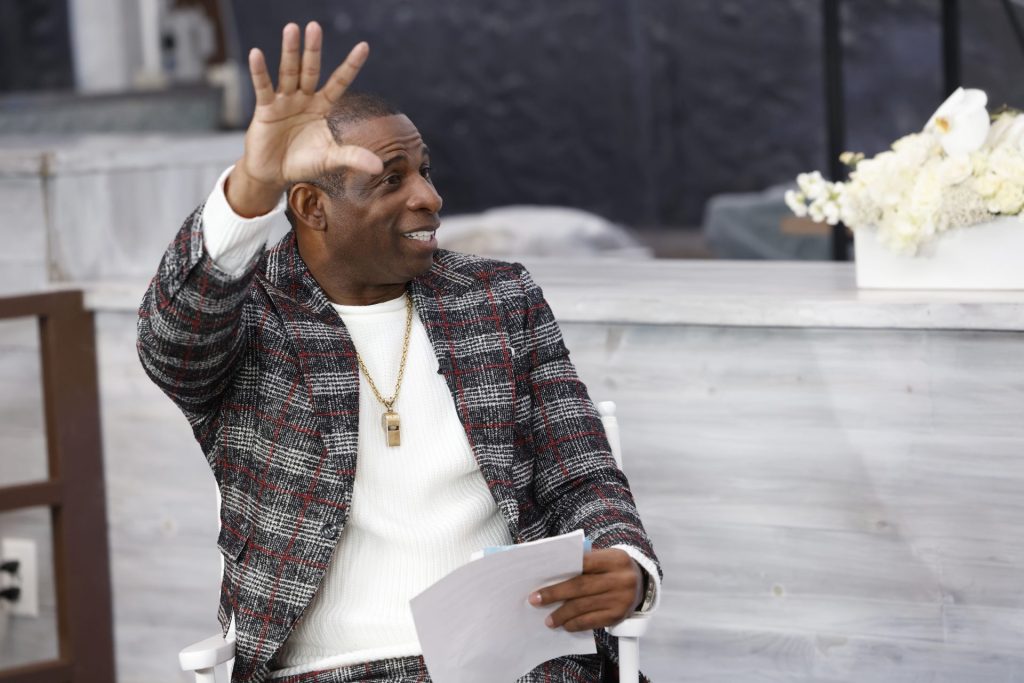 Deion Sanders calls on the NCAA to hire more people to college coaching staffs as student athletes make more money.