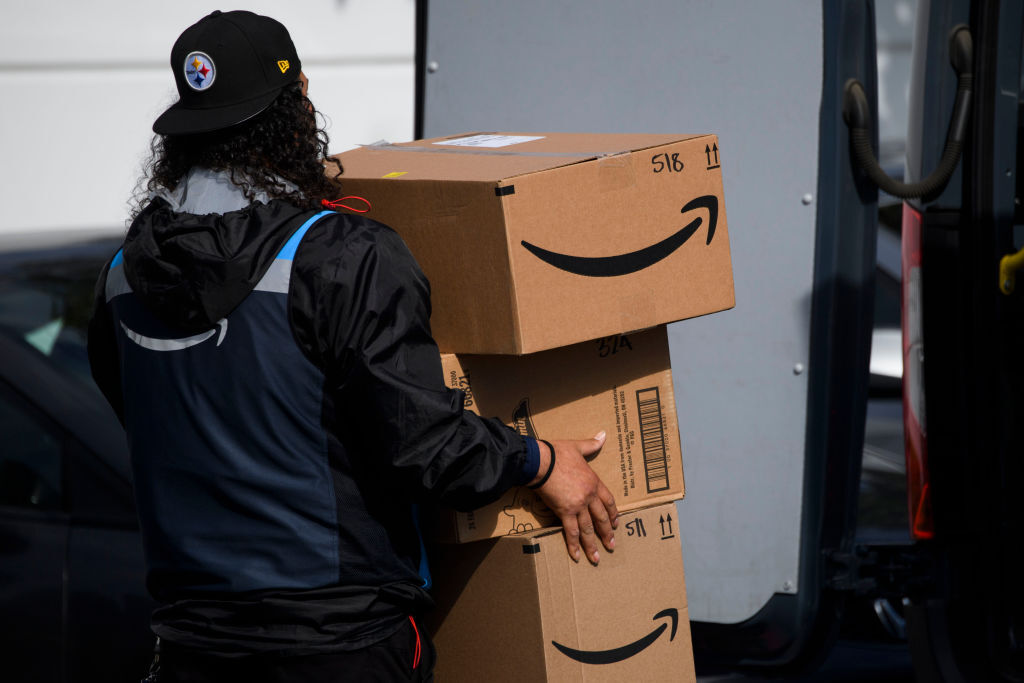 WATCH: Amazon Driver Delivers Package To Officer During SWAT Standoff With Armed Man