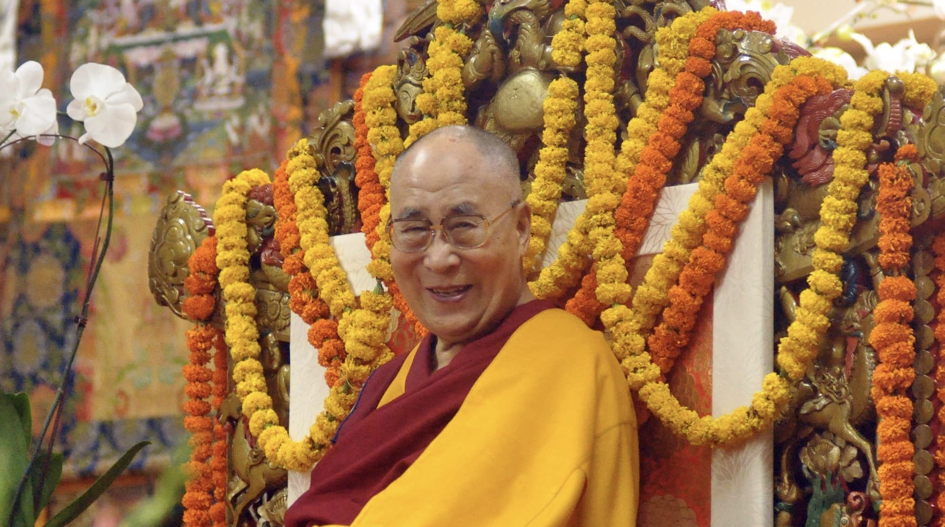 Tibetan Leader Says Dalai Lama Is ‘Beyond The Sensorial Pleasures’ In Response To Tongue-Sucking Controversy
