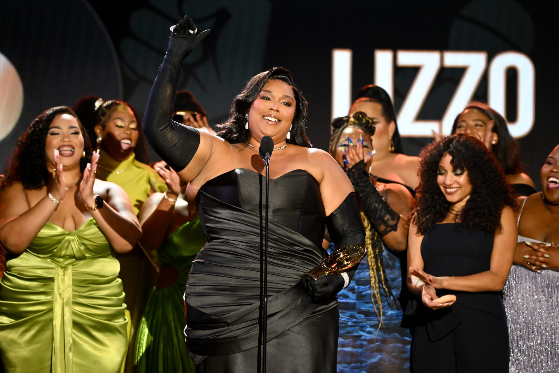 Lizzo Accepts Humanitarian Award At Black Music Coalition Gala Hours After Stylist Files Lawsuit: ‘I Needed This Right Now’ thumbnail