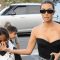 Saint West Flips Off Paparazzi With Kim Kardashian