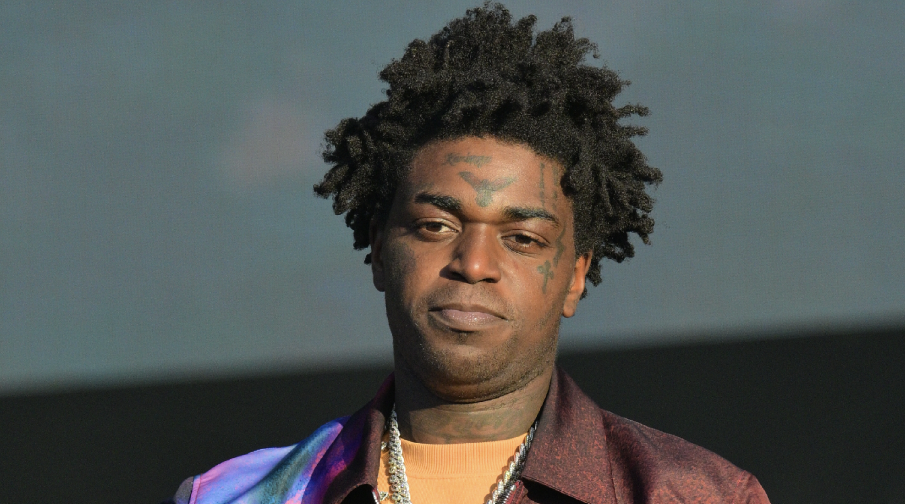 Not In A Good Mood! Kodak Black Throws Rocks At Reporter Following His Release From Jail