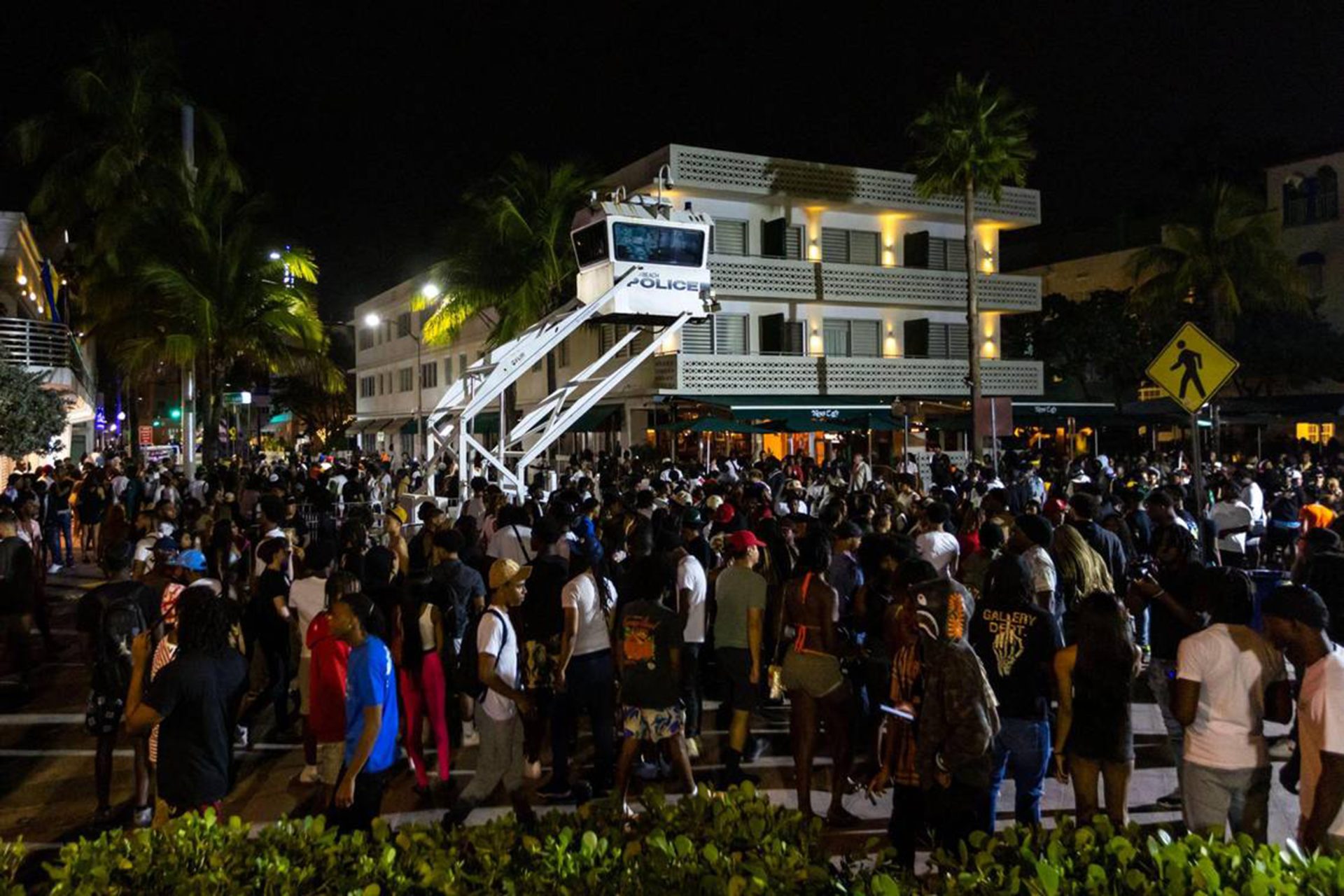 Crowds gather at Ocean Drive and Eighth Street during spring break in Miami Beach, Florida, on March 18, 2023.