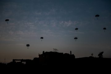 NORTHERN GAZA, GAZA - MARCH 02: A view of new humanitarian aid after arriving to the northern Gaza Strip from sky with parachutes in Northern Gaza, Gaza on March 02, 2024. The Egyptian army had announced Saturday airdropping a new aid batch to areas in the northern Gaza Strip.