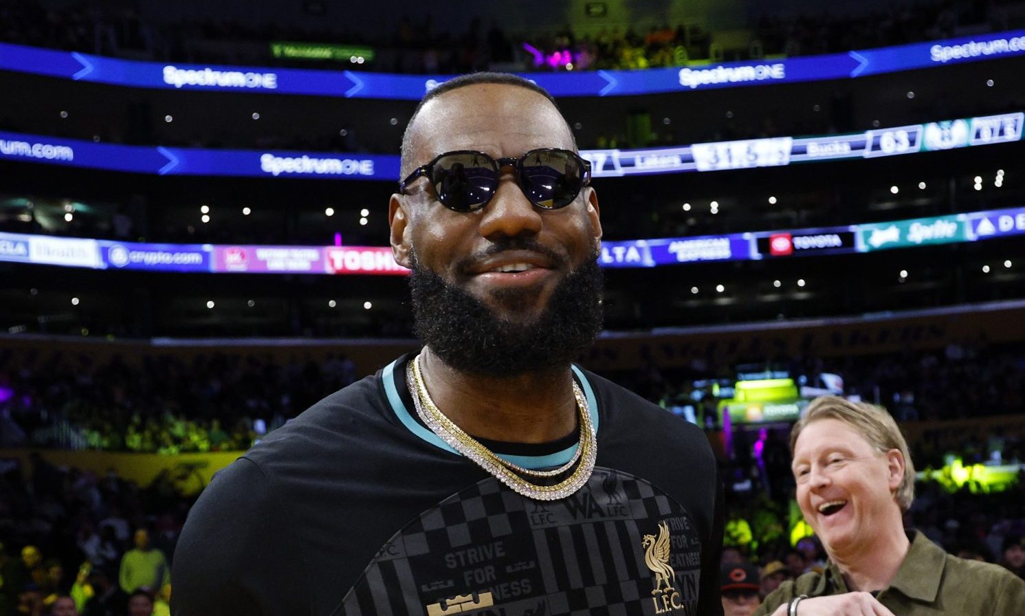 Wayment! Social Media Goes Nuts Over LeBron James’ Courtside Interaction With Lakers Owner Jeanie Buss thumbnail