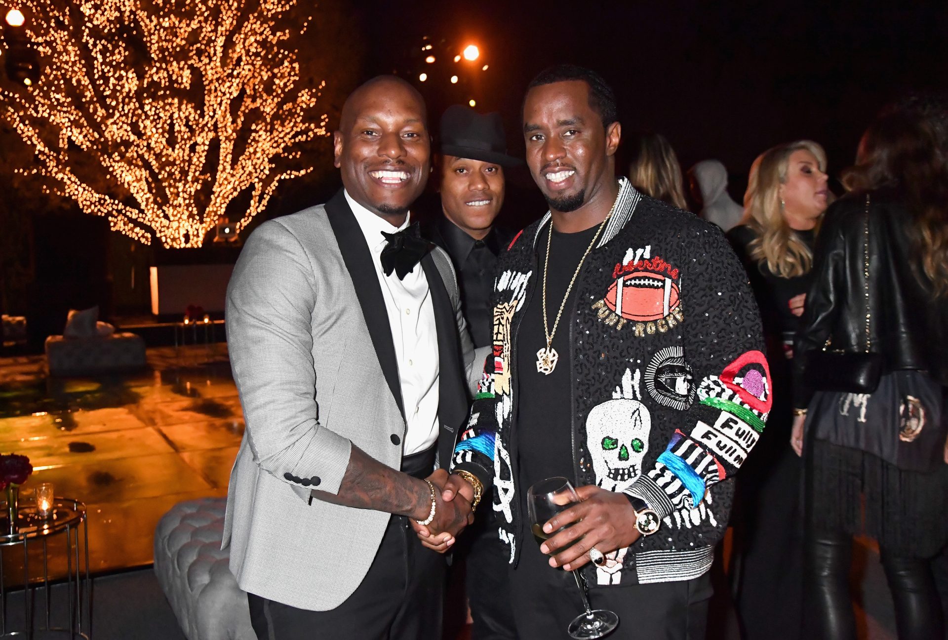 LOS ANGELES, CA - JUNE 21: Tyrese Gibson and Mario Winans toast to Sean "Diddy" Combs and the world premiere of Can't Stop Won't Stop at the official after party powered by CIROC Vodka and Deleon Vodka at a private residence on June 21, 2017 in Los Angeles, California.
