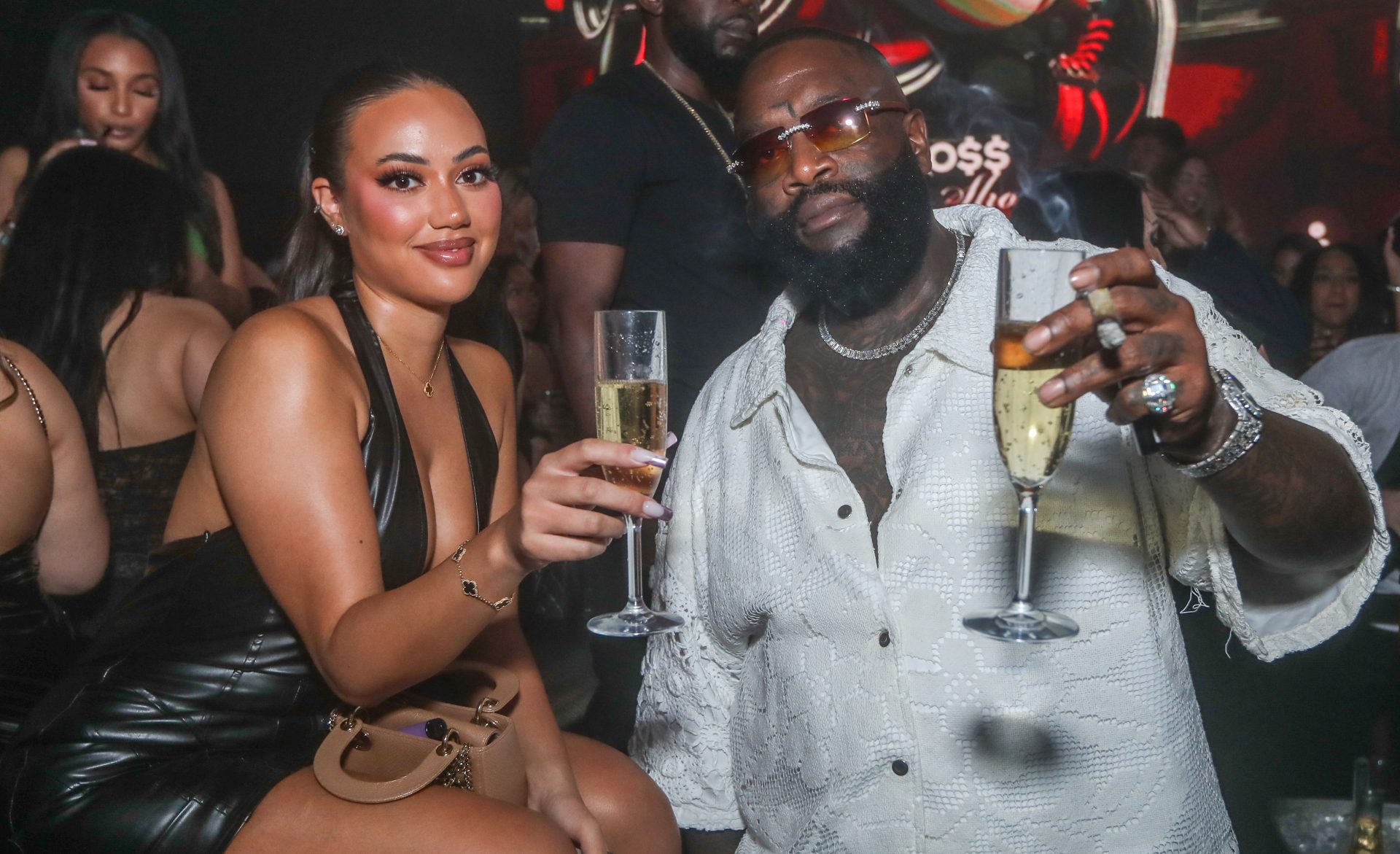 New Boo?  Rick Ross' name appears to be depicted on a woman's neck