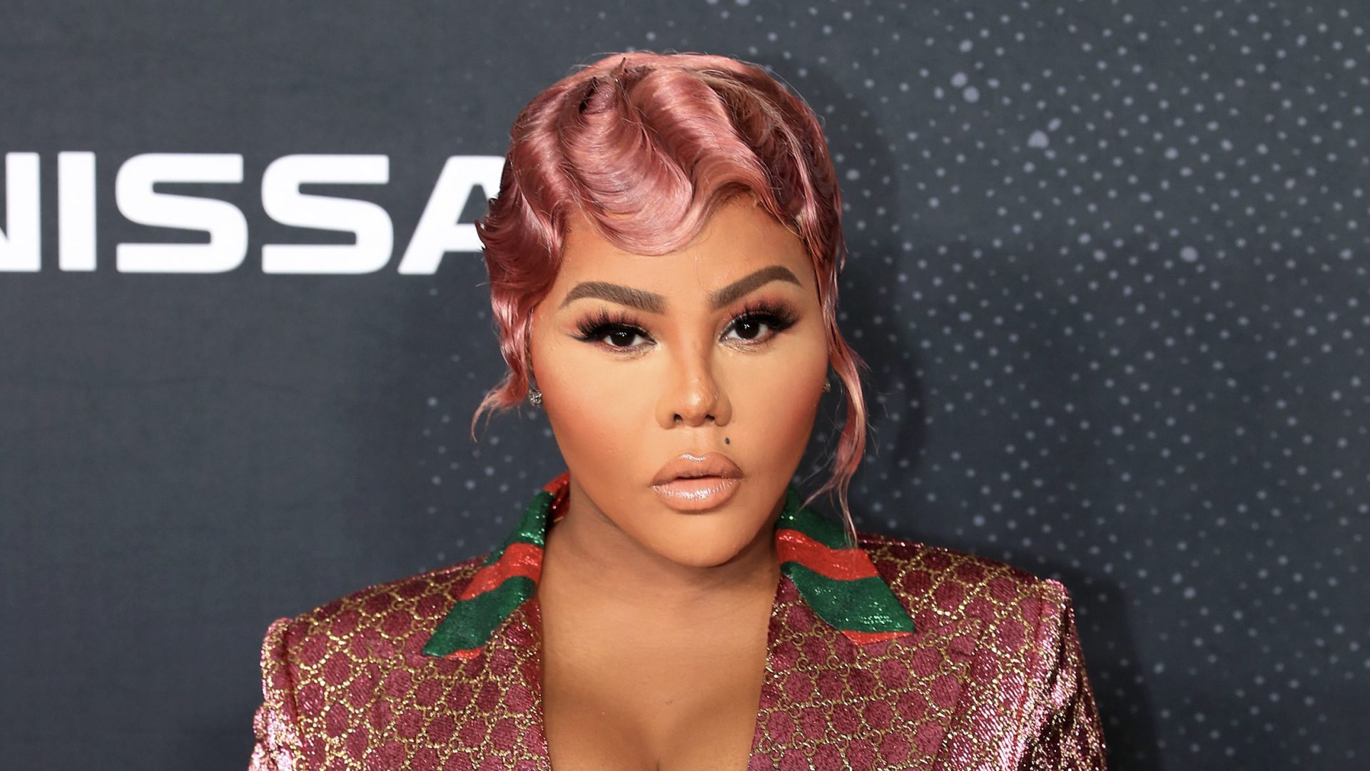 Whew! Viral Video Fuels Dating Speculation Around Lil’ Kim & THIS Rapper (WATCH)