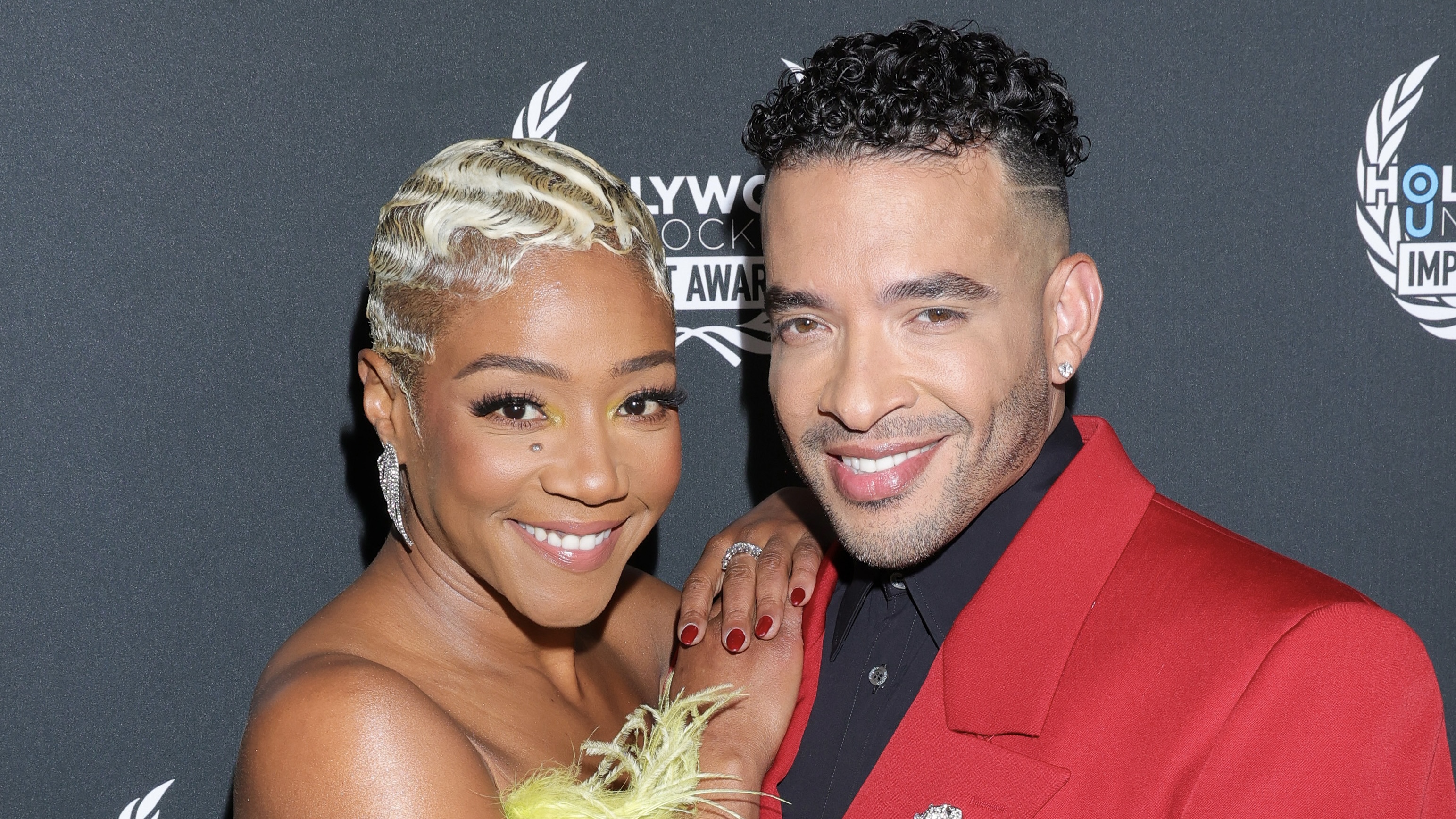 Tiffany Haddish & Jason Lee Spark Q's W/ Photo Alongside Baby