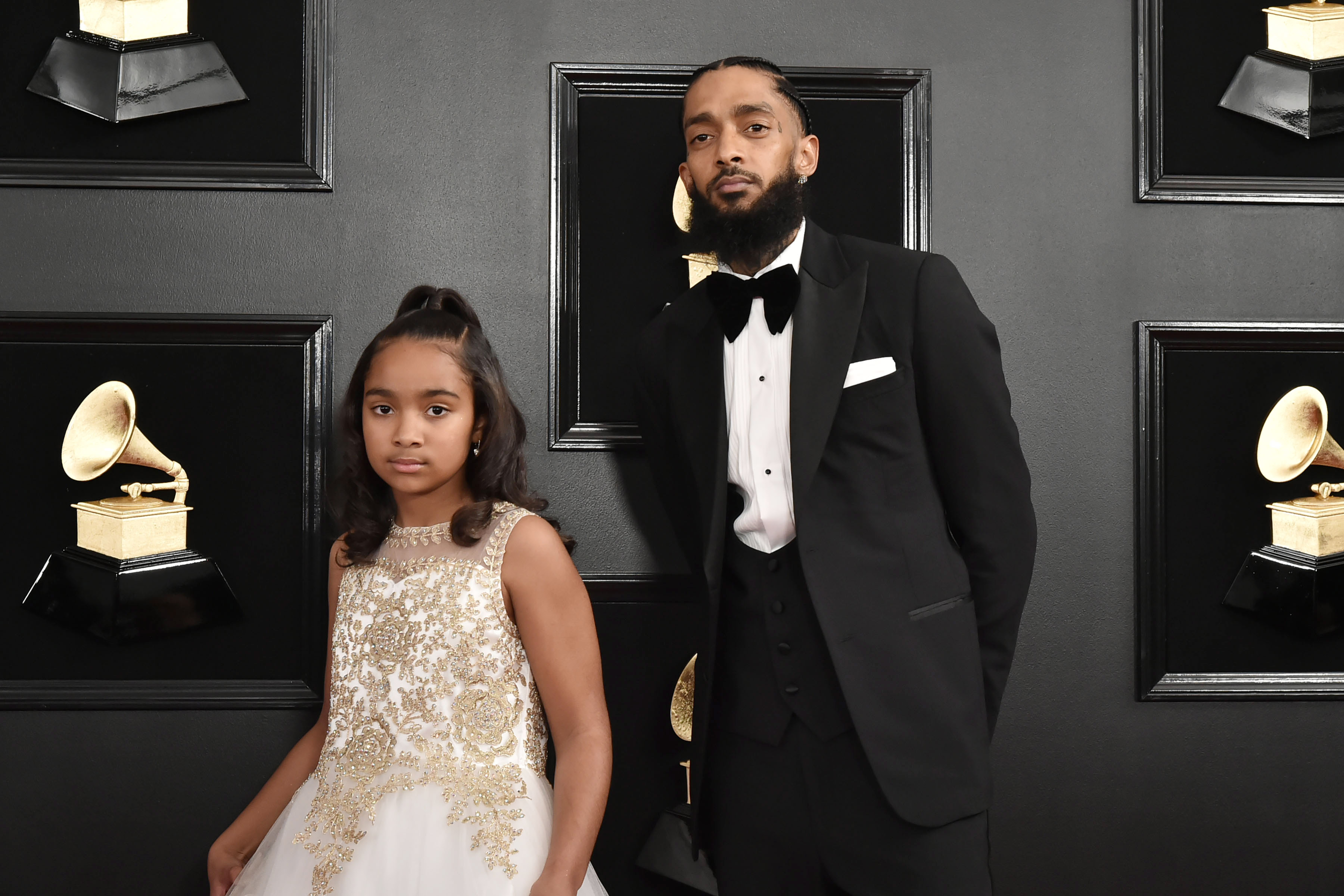 Congratulations! Nipsey Hussle’s Daughter Emani Celebrates Major Milestone Surrounded By Family (PHOTO)