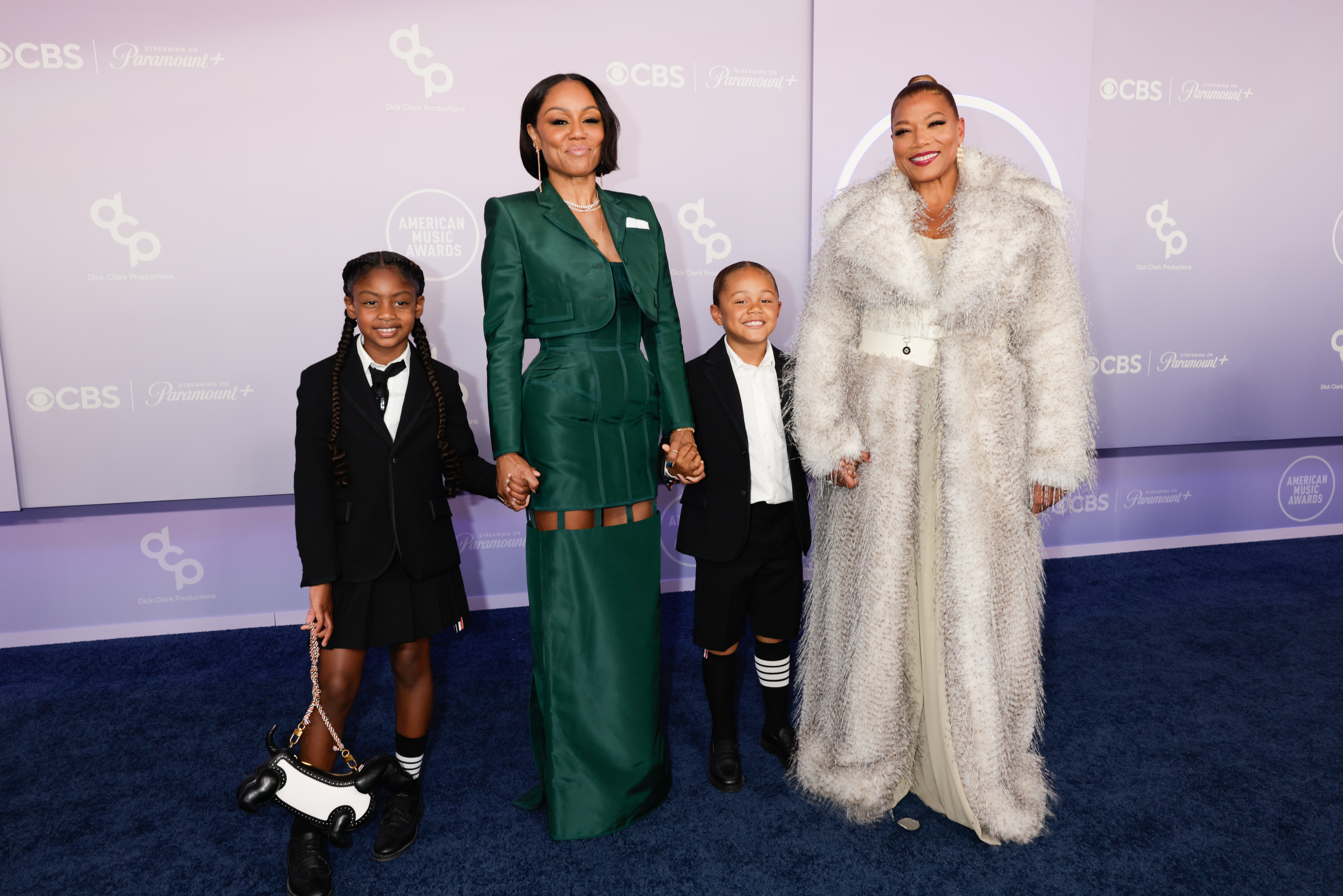Queen Latifah Goes Viral After Surprise AMAs Appearance With Partner and Son Rebel Queen Latifah Goes Viral After Surprise AMAs Appearance With Partner and Son Rebel