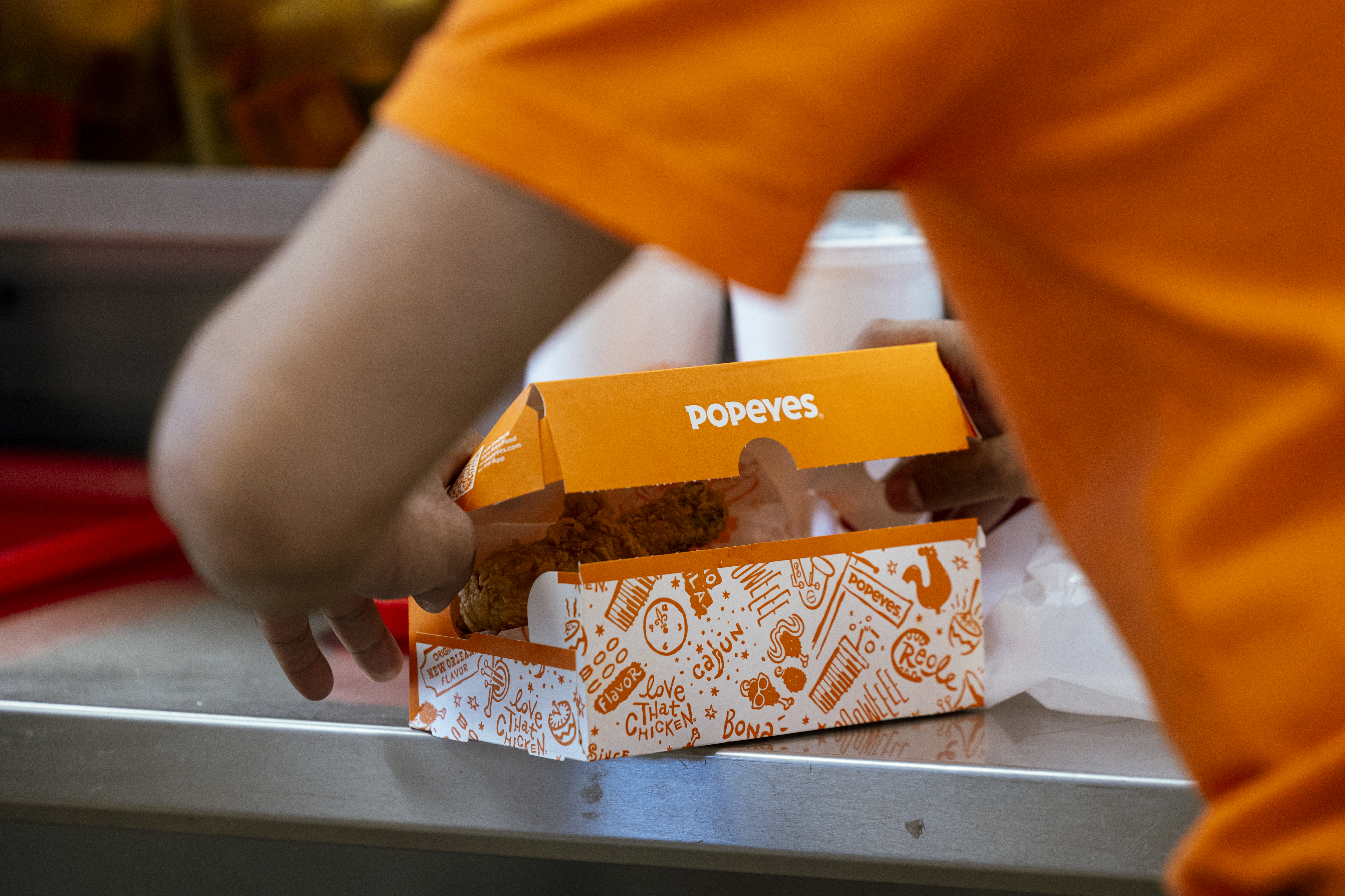 Say, WHAT?! Texas Customers Sue Popeyes For Over $1.5M After Allegedly Finding “Condom-Like Foreign Object” In Chicken